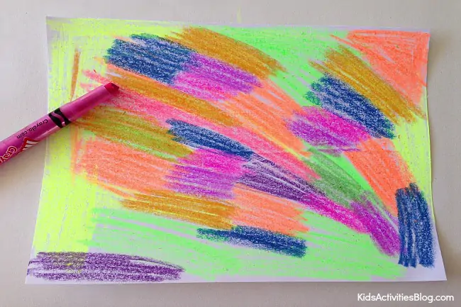 How to Scratch Art with Wax Crayons {Crayon Art} Step 1 - How to Scratch Art with Wax Crayons - Crayon art - bright colorful blocks of color shown on a white paper