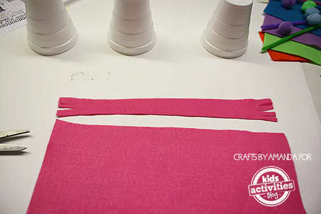 Step 1 - cutting felt sheets for Snowman Craft from Foam Cups