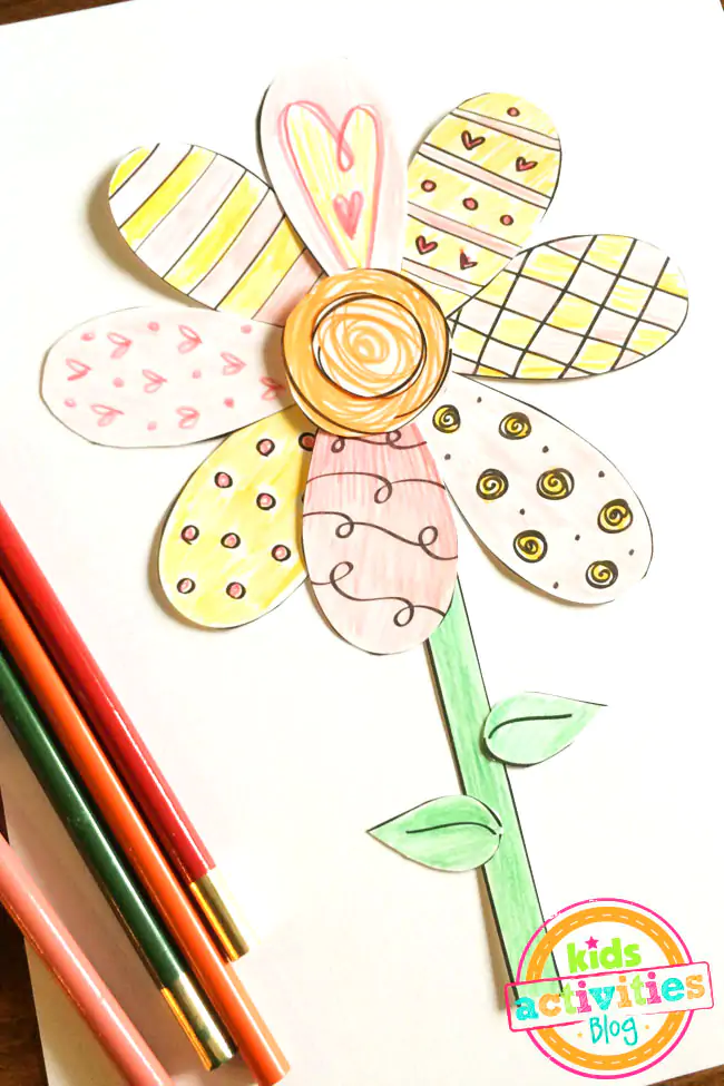 Free printable flowers - Printable Spring Flower Coloring Craft designed by Jen Goode - completed flower craft made from printable templates pictured with colored pencils